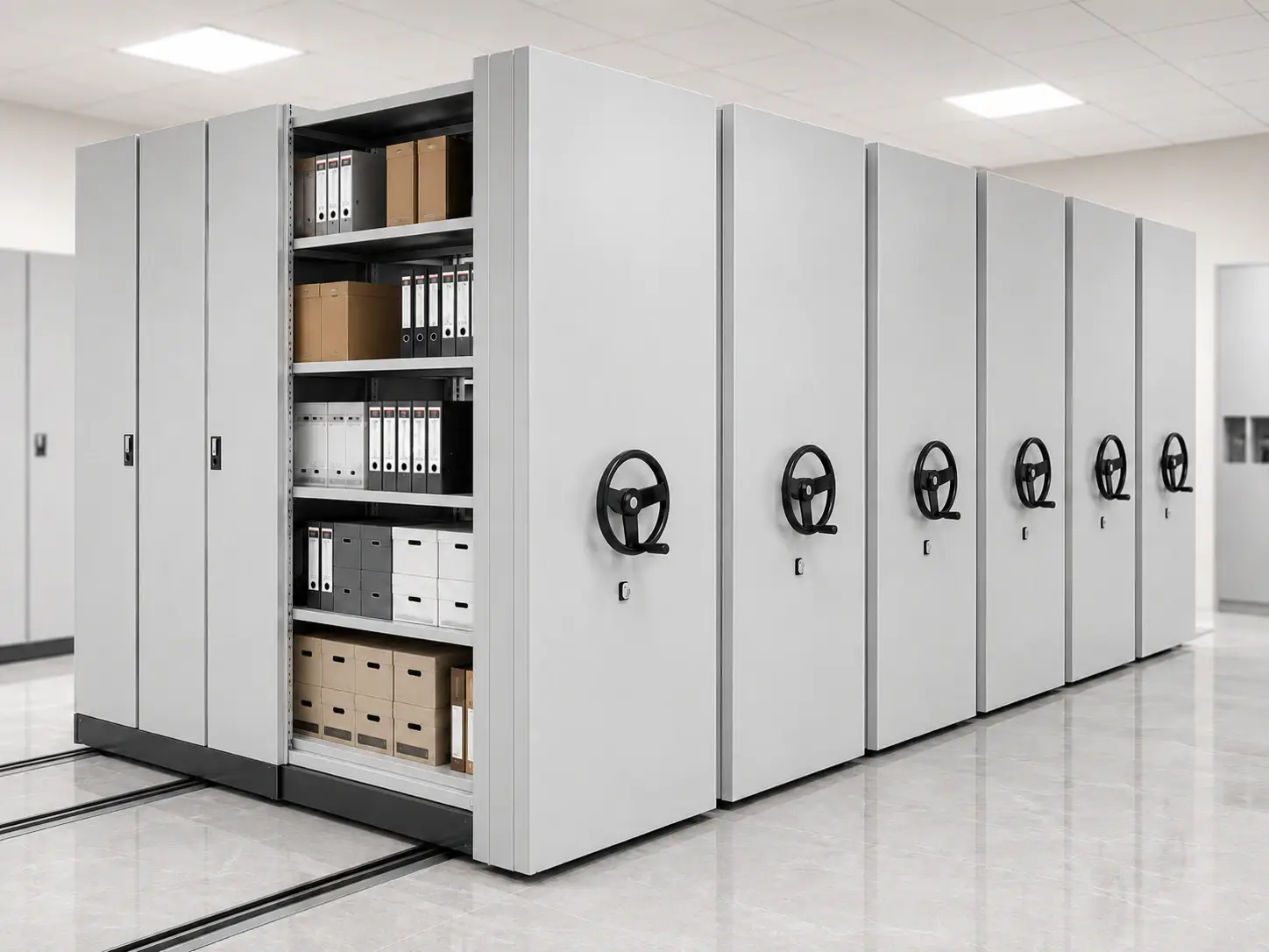 Manual Mobile Shelving System with handwheel drive and open archive shelving